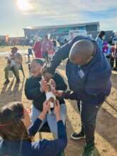 TEARS AWA VACCINATES A RESIDENT'S PUPPY