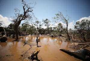 A child in floodwater after the cyclone