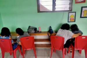 Students helping each other with homework