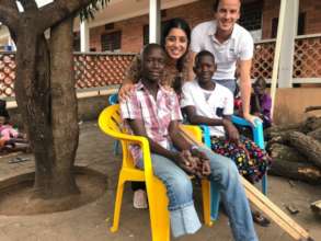 Brian with His Sister and Volunteers