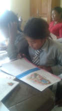 Balambu students reading after school