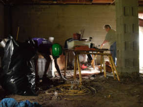 A volunteer helps a homeowner in North Carolina