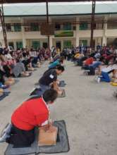 Participants in the BLS Training demonstrating CPR