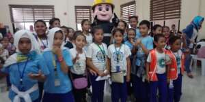 Little Nurses at graduation with fireman mascot