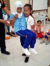 Firemen train "little nurses" in rescue techniques