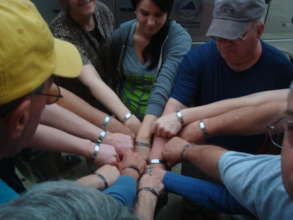 Team Members Wearing Olsen's MIA Bracelet