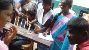 Conducting candle lighting game