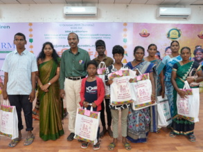 District Rehabliation Officer gives gifts to kids