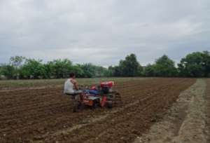 Land preparation using OISCA tractor.