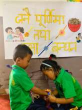 Early years students celebrating rice pudding day