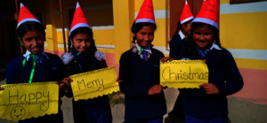Children wishing our supporters a Merry Christmas!