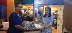 Finance officer, Sarina, buying goods for stalls!