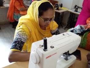 Using an electric sewing machine!