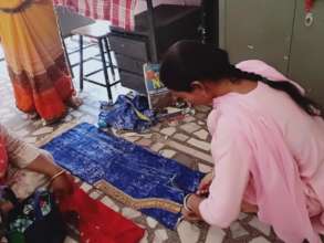 Cutting out fabric...