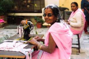 Offer a sewing machine to a Rajasthani woman