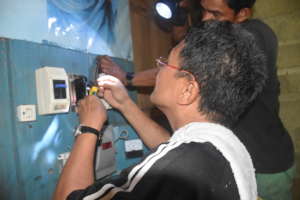 technician repairing a circuit breaker