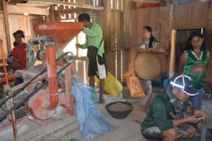 women are happy their rice mills are working again