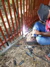 Our welder hard at work at the raptor rehab center