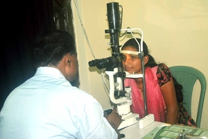Eye Consultant Examining a Patient