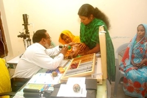 Specialist Examining a Child's Eye