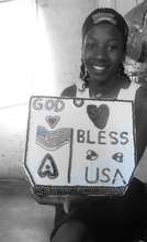 Aisha Displays her Art Piece