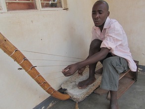 Steven Rehearsing Bass Bow Harp