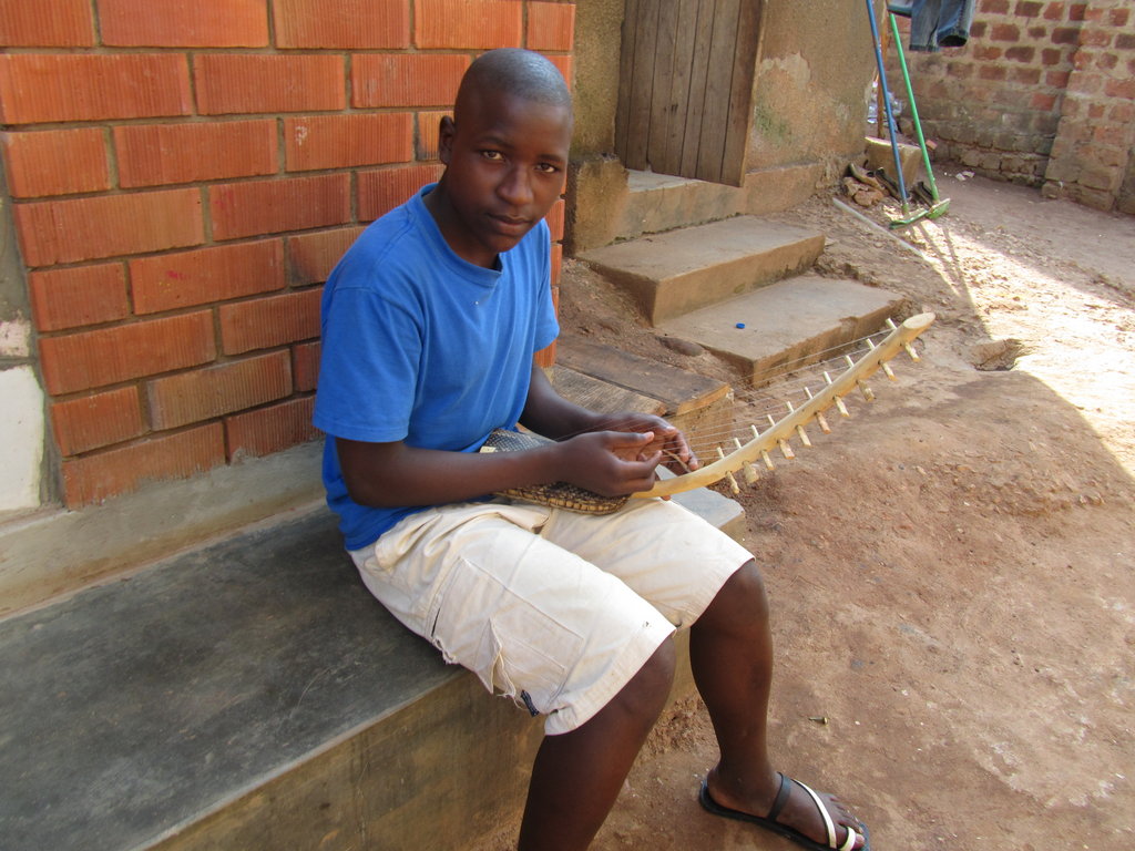 Augustine Composing on a Bow Harp