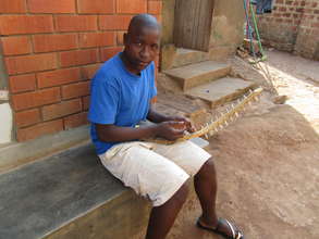 Augustine Composing on a Bow Harp