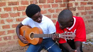 Branco Showing Guitar Chords to Grant