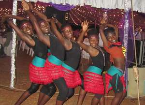 Bitone girls pose for a photo after a show
