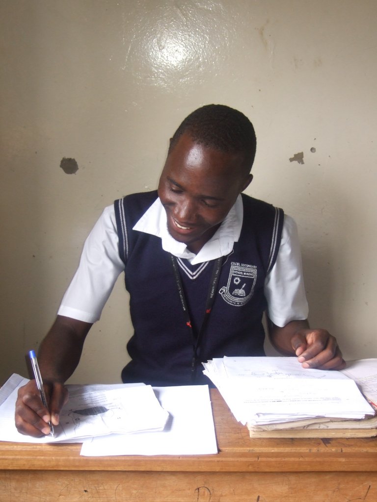 Steven in Class at Kawempe Royal