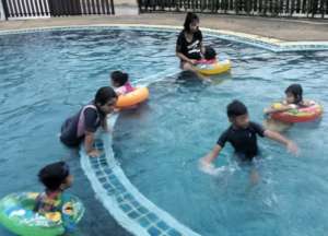 Kids playing in pool during outing