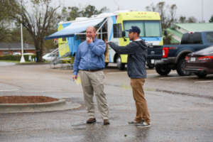 Sean (left) and our team set up temporary shelters