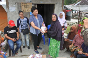 Aid distribution in Tanjung Padang