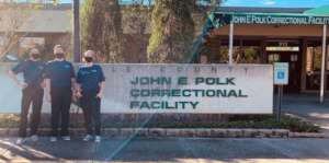 Staff outside of the John Polk Correctional