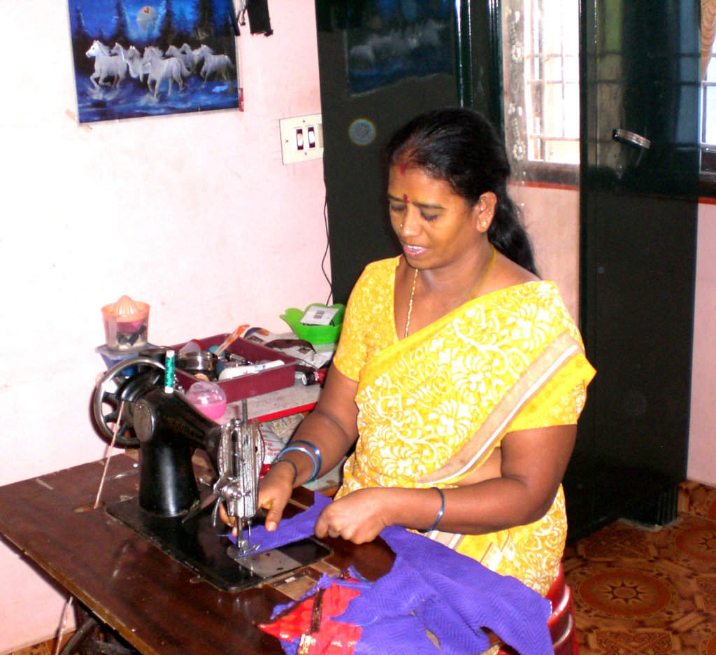 sewing machines to 15 widows & poor women to earn