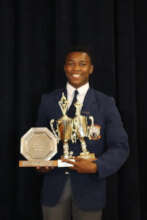 Okuhle with his trophies at prize giving