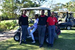 Our boys worked hard unloading clubs.
