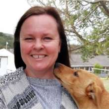 Our principal Sharon, and our school dog, Nyala