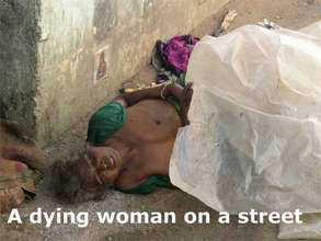 An abondoned women dying on the street