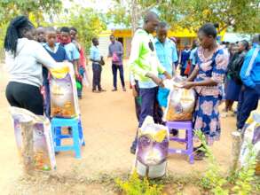 Students get relief rice portions at Kitui centre