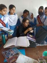Fellow Ayesha and her students working on projects