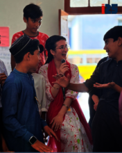 2025 Fellow and her students at Summer School