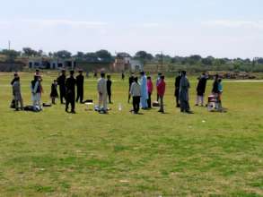 Classes in open fields near school