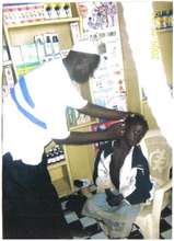 Medical volunteer treating a rescued child laborer