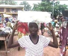 Child laborer selling water