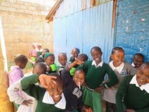 Children are happy attending Compassion school