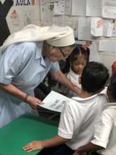 Mother Maria Luisa with students at the school