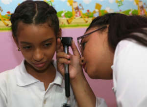 Doctor checking a student