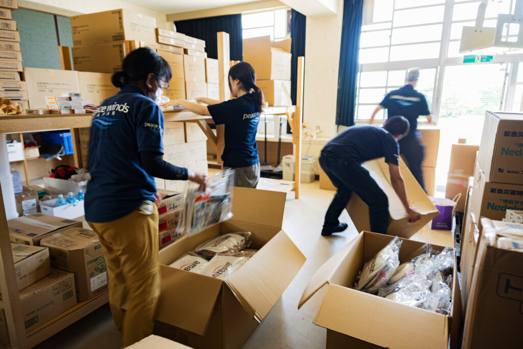 Peace Winds team prepares supplies distribution